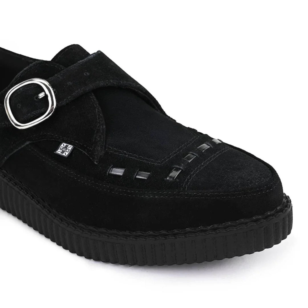 Zapatos de plataforma con hebilla Monk y punta puntiaguda estilo creeper en ante negro.