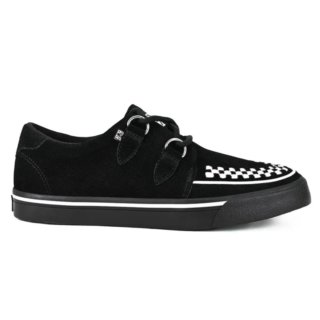 Zapatillas deportivas de plataforma con punta estilo creeper en ante blanco y negro.