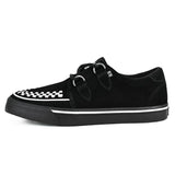 Zapatillas deportivas de plataforma con punta estilo creeper en ante blanco y negro.