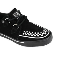 Zapatillas deportivas de plataforma con punta estilo creeper en ante blanco y negro.