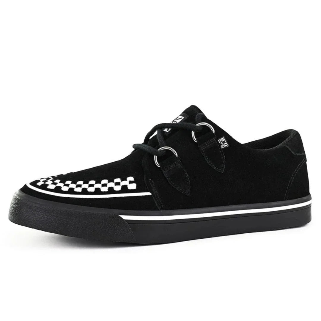Zapatillas deportivas de plataforma con punta estilo creeper en ante blanco y negro.