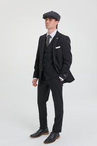 Traje negro vintage de hombre de los años 20