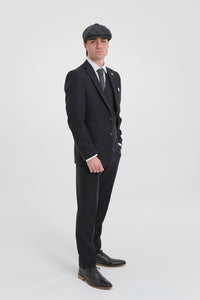 Traje negro vintage de hombre de los años 20