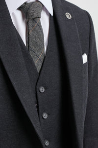 Traje negro vintage de hombre de los años 20
