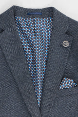 Traje de hombre de 3 piezas azul marino con chaleco cruzado.