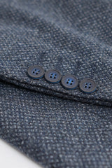 Traje de hombre de 3 piezas azul marino con chaleco cruzado.