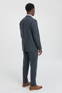 Traje de hombre de 3 piezas azul marino con chaleco cruzado.