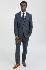 Traje de hombre de 3 piezas azul marino con chaleco cruzado.