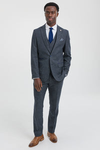 Traje de hombre de 3 piezas azul marino con chaleco cruzado.