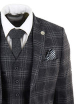 Traje de tres piezas de tweed a cuadros gris carbón para hombre