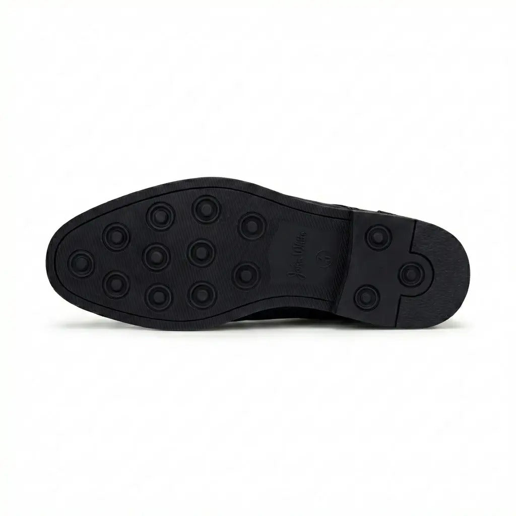 Zapatos Derby de hombre de piel negra con puntera lisa y cordones, marca Tanner.