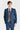 Traje azul marino Viceroy con chaleco de tweed marrón Harris en contraste.