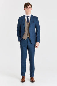 Traje azul marino Viceroy con chaleco de tweed marrón Harris en contraste.