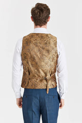 Traje azul marino Viceroy con chaleco de tweed marrón Harris en contraste.
