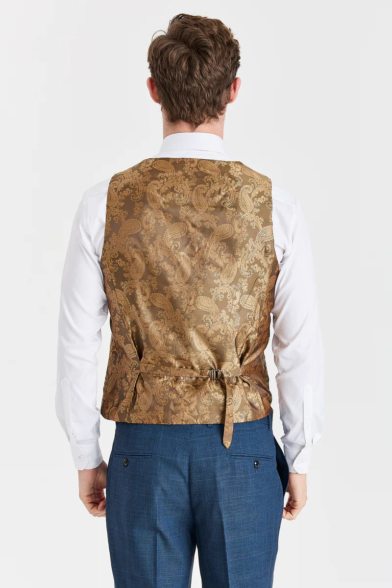 Traje azul marino Viceroy con chaleco de tweed marrón Harris en contraste.